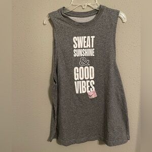 Women’s Nike Dri-Fit work out Sleeveless T-shirt. Size Medium.